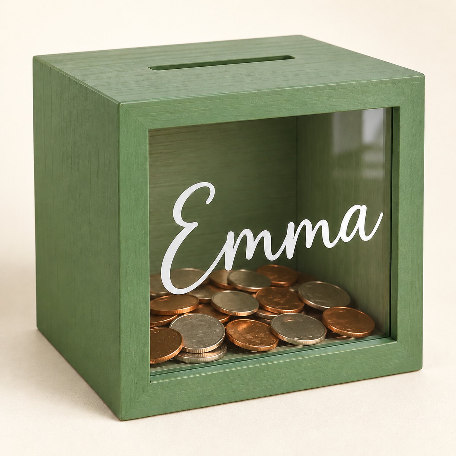 Emma savings bank with coins inside